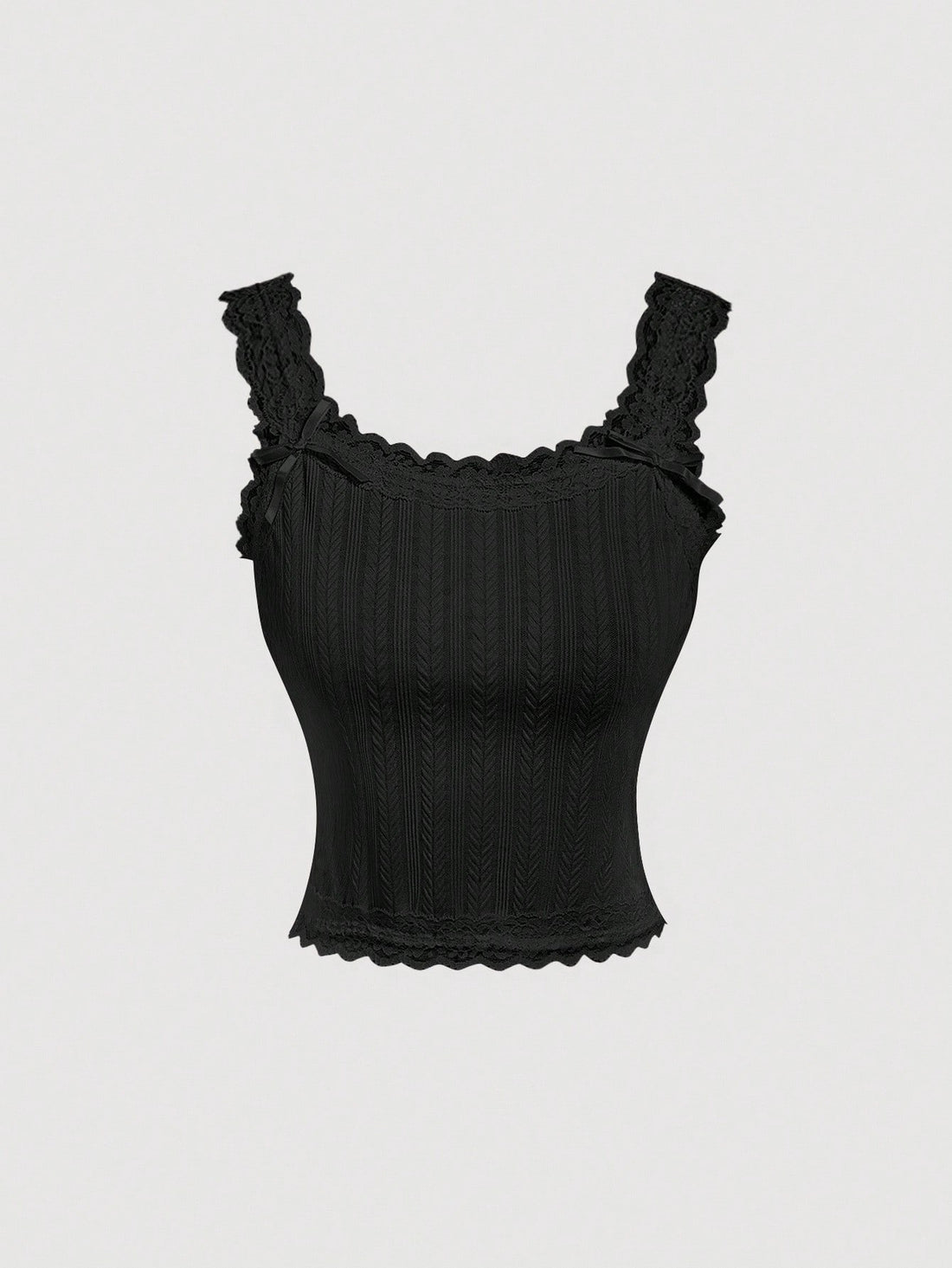 Black jacquard textured camisole top featuring contrast lace trim, bow decoration, scoop neck, and wide shoulder straps.