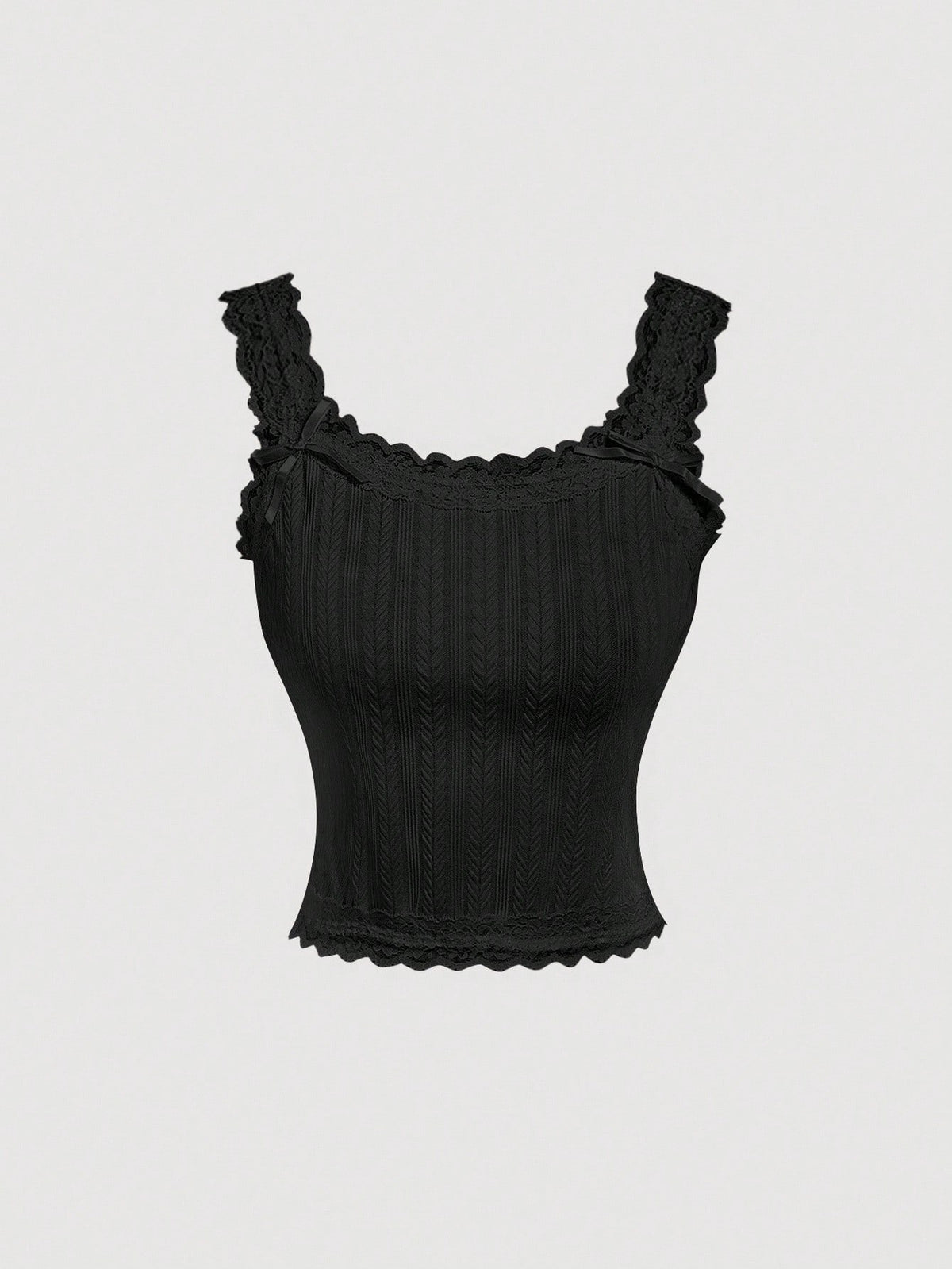 Black jacquard textured camisole top featuring contrast lace trim, bow decoration, scoop neck, and wide shoulder straps.
