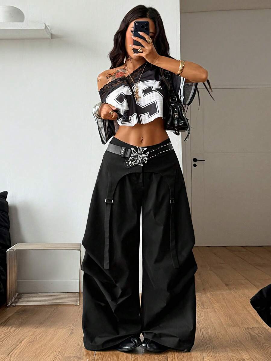 Women's loose fit wide leg utility parachute pants with functional pockets and low waist design