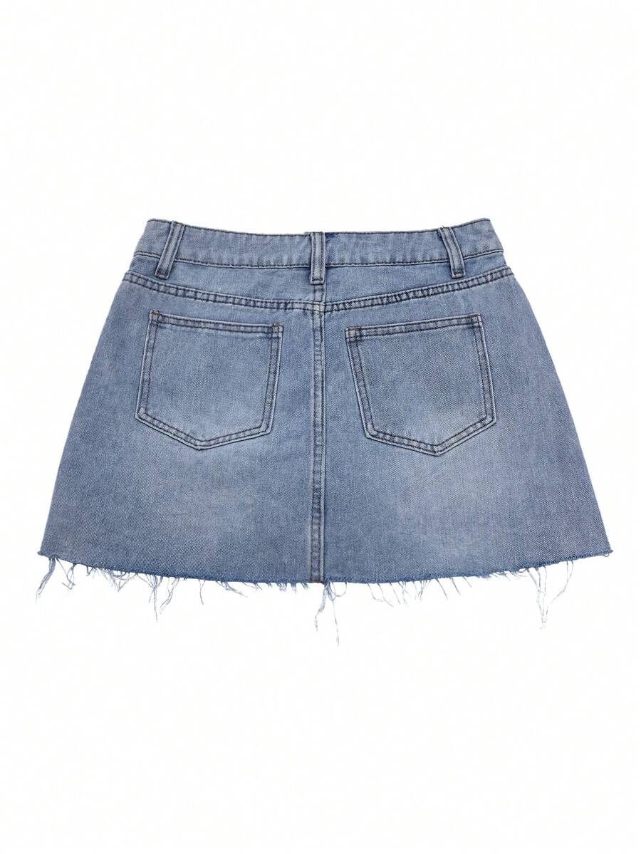 Y2K distressed mini skort with button and pocket details, natural mid waist, regular fit, and casual streetwear styling.