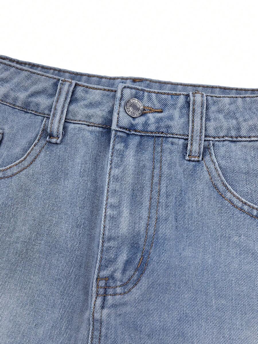 Y2K distressed mini skort with button and pocket details, natural mid waist, regular fit, and casual streetwear styling.