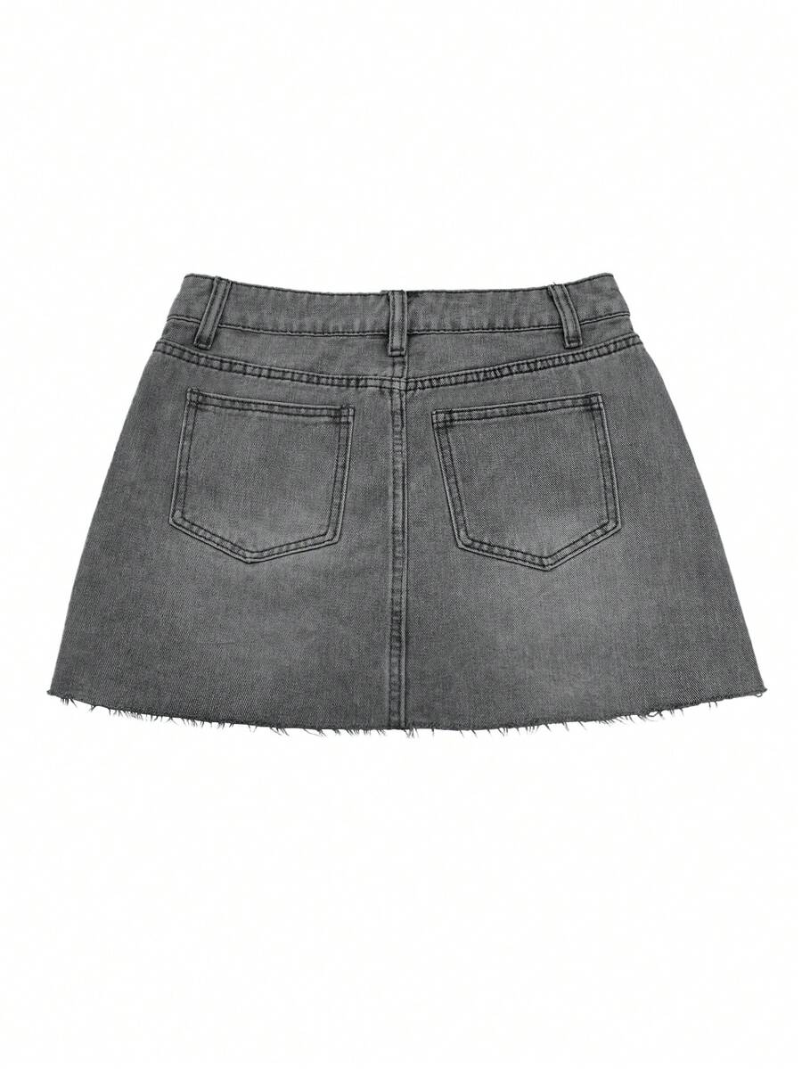 Y2K distressed mini skort with button and pocket details, natural mid waist, regular fit, and casual streetwear styling.