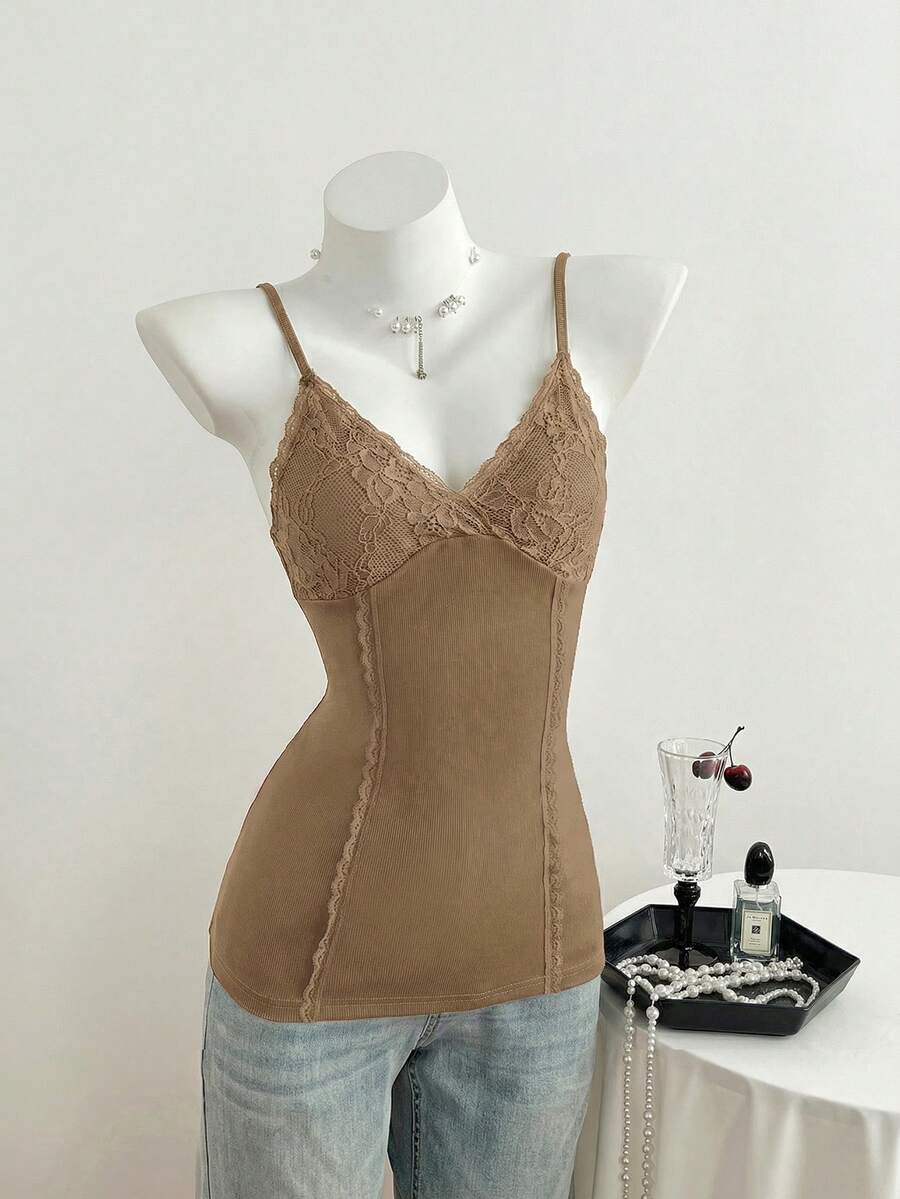Women's slim fit backless cami tank top with contrast lace patchwork details, spaghetti straps, and high-stretch knitted ribbed fabric.