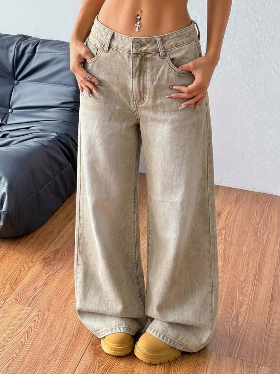 Women's loose wide-leg jeans in light wash denim with low waist and extra-long relaxed fit