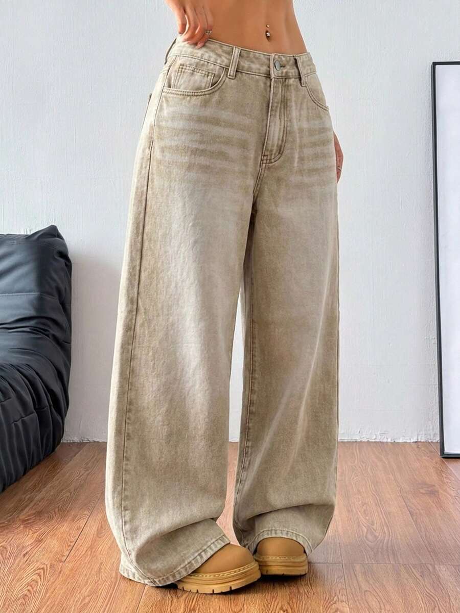 Women's loose wide-leg jeans in light wash denim with low waist and extra-long relaxed fit