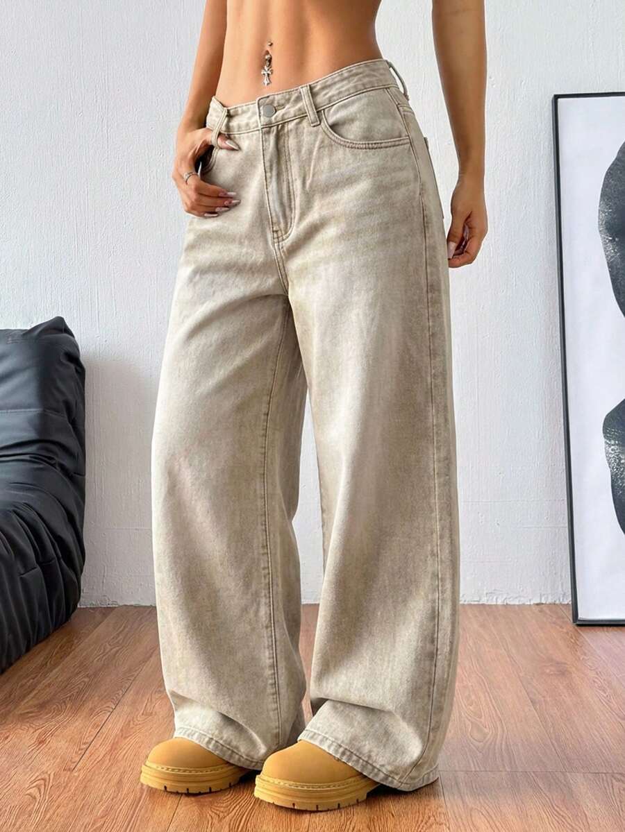 Women's loose wide-leg jeans in light wash denim with low waist and extra-long relaxed fit