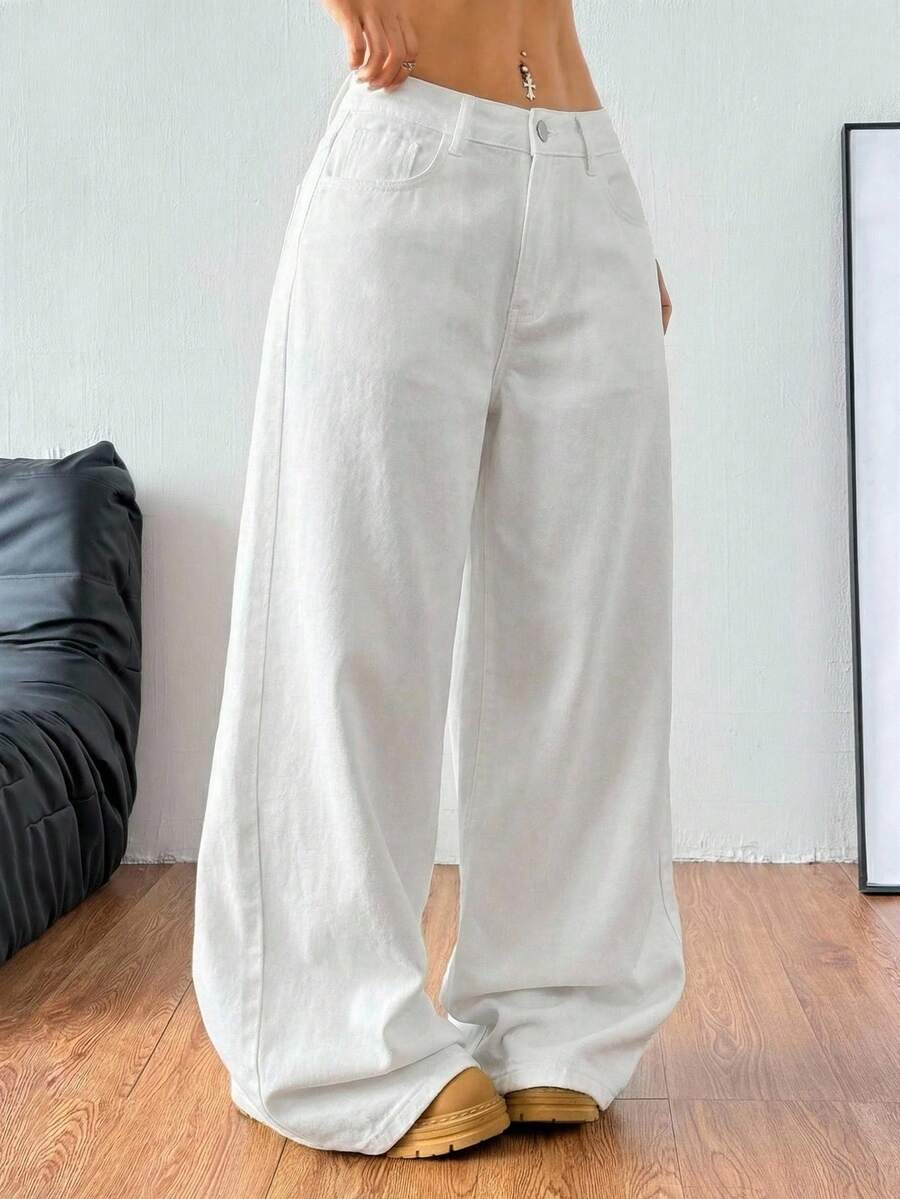 Women's casual loose fit wide leg denim jeans with functional pockets and low waist design.