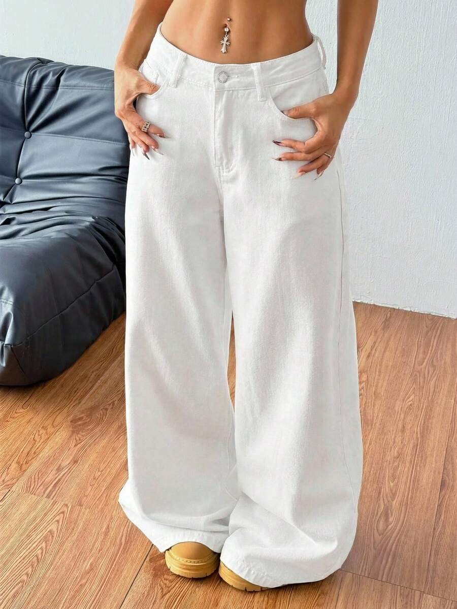 Women's casual loose fit wide leg denim jeans with functional pockets and low waist design.