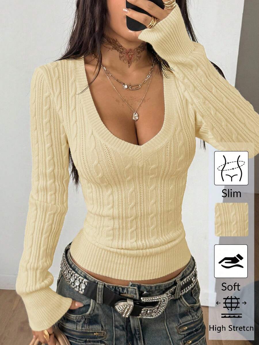Women's slim fit cable-knit sweater with a V-neckline and long sleeves in solid green rib knit fabric.