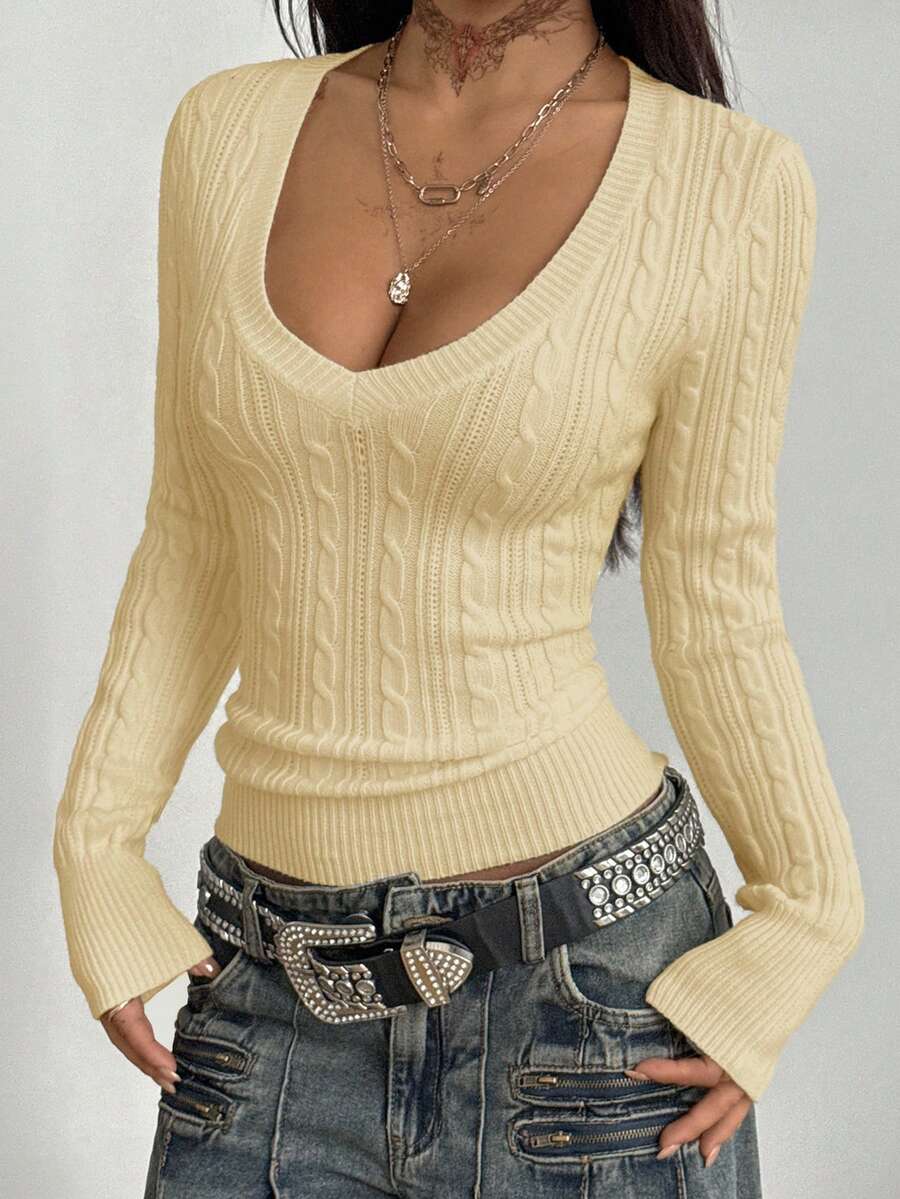 Women's slim fit cable-knit sweater with a V-neckline and long sleeves in solid green rib knit fabric.