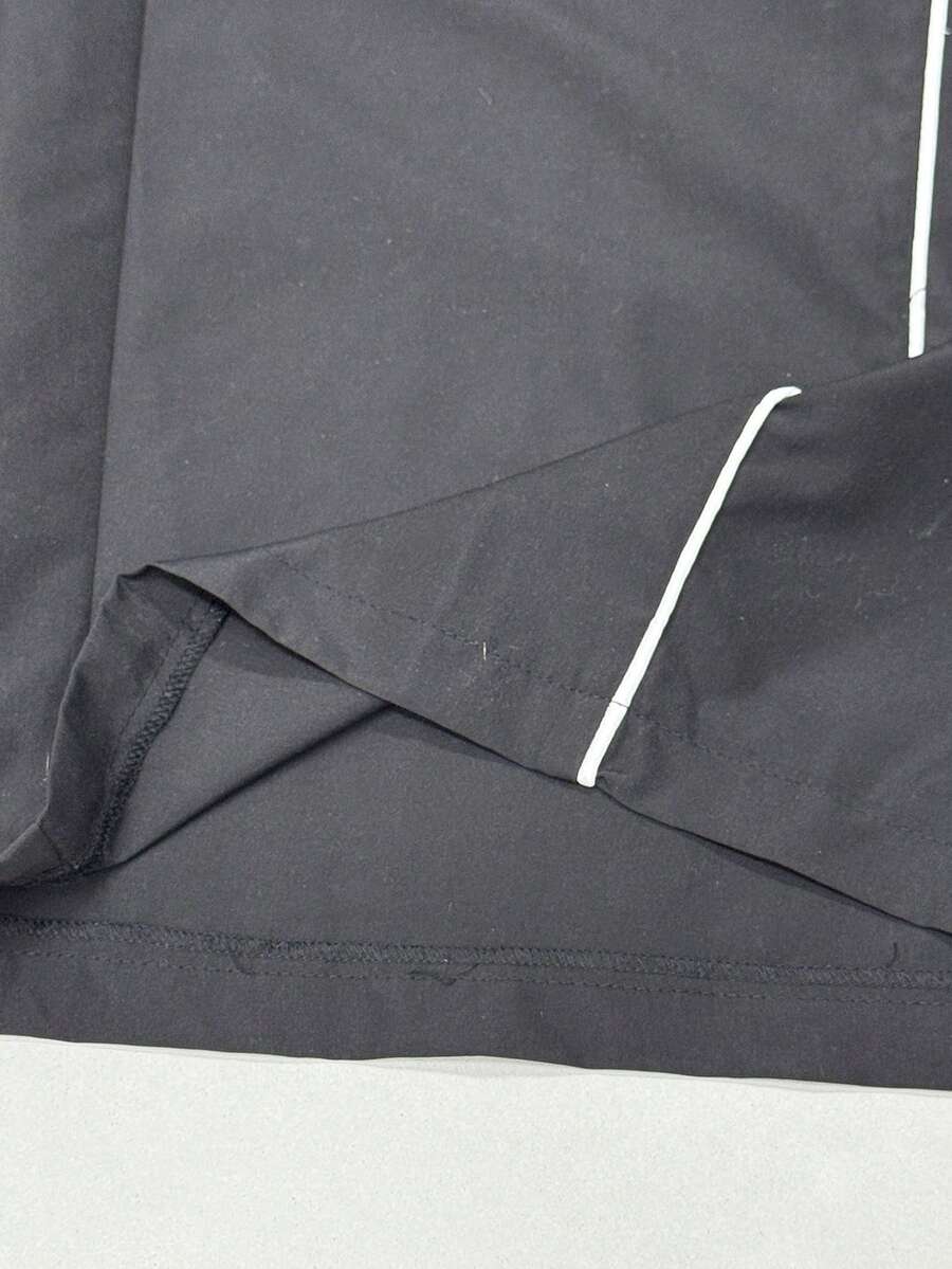 Plus size loose straight leg casual pants with elastic drawstring waist, contrast binding, and side pockets.