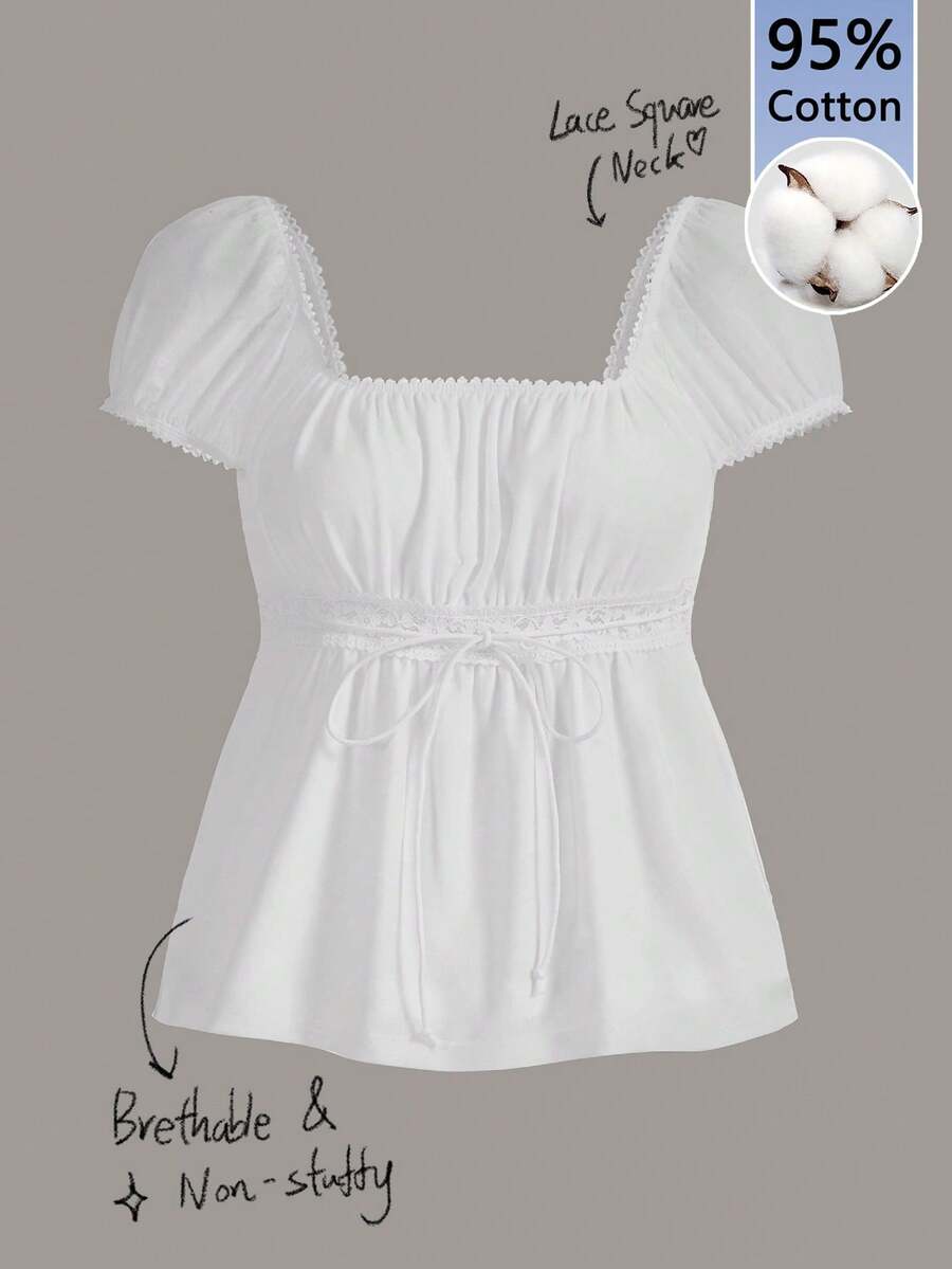 Women's black short puff sleeve top featuring a square neckline, ruched bust detail, and flared ruffle hem.
