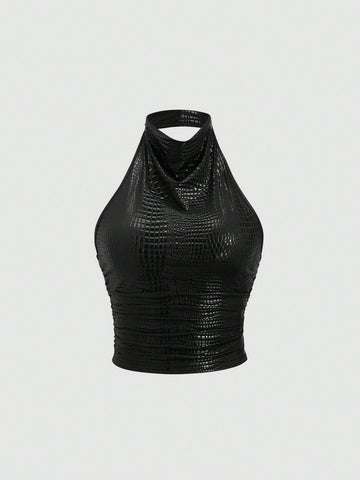 Sweetra women's black PU halter neck crop top with backless sleeveless design, draped ruched front, slim fit, and regular hem for party or stage wear.