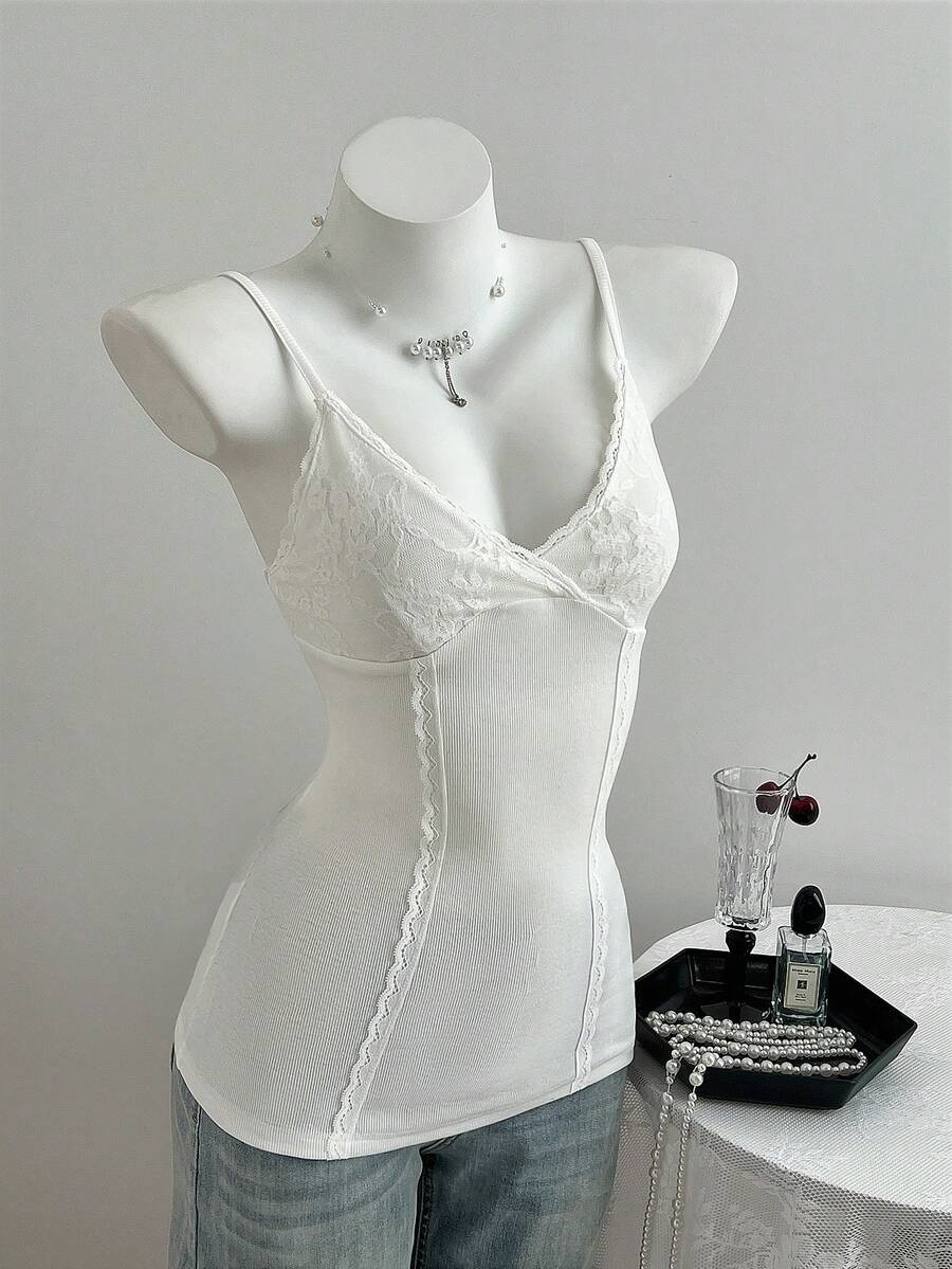 Women's slim fit backless cami tank top with contrast lace patchwork details, spaghetti straps, and high-stretch knitted ribbed fabric.