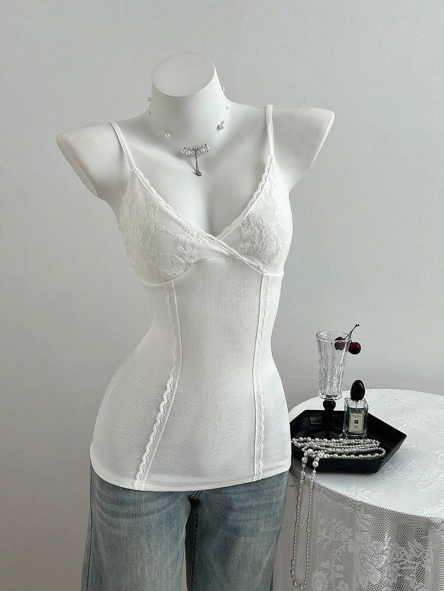 Women's slim fit backless cami tank top with contrast lace patchwork details, spaghetti straps, and high-stretch knitted ribbed fabric.