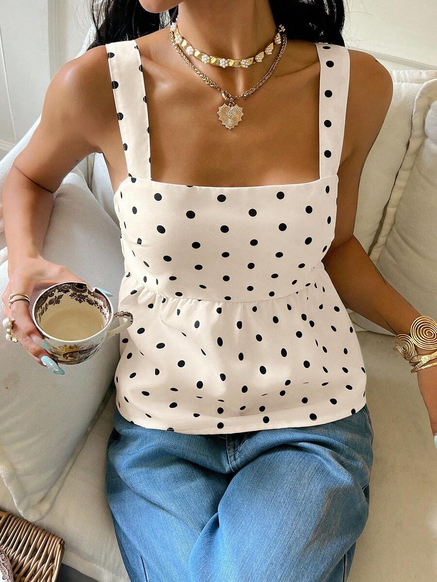 Women's casual polka dot tank top with tie-front knot, strap neckline, backless design, and ruffle flared hem