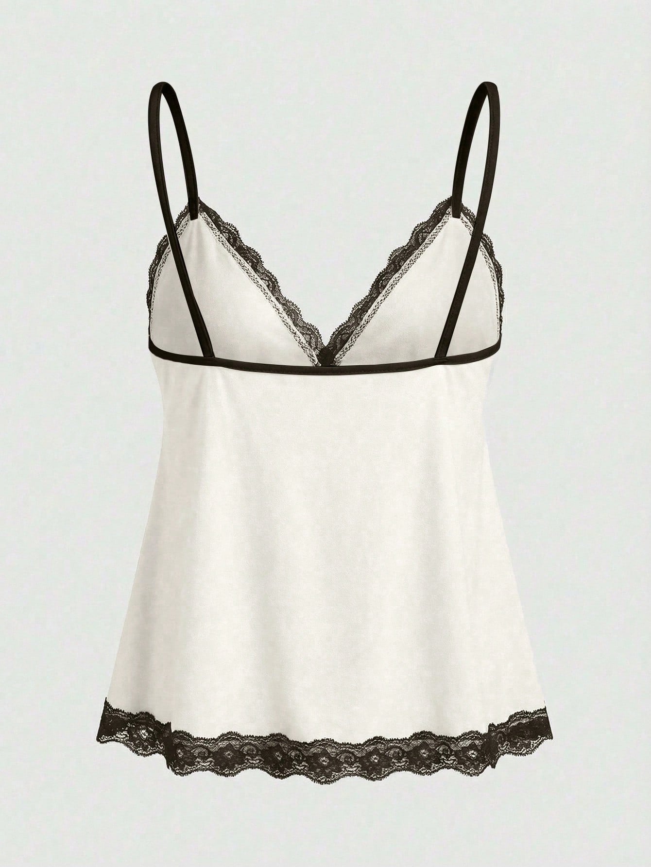 Women's spaghetti strap camisole with contrast lace patchwork, slim fit silhouette, plain design, and flared hem.