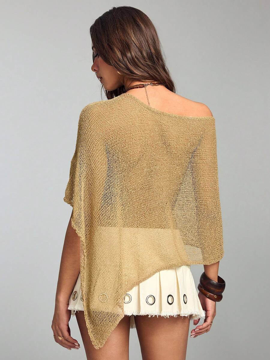 Women's casual hollow knit poncho top with boat neck, cloak sleeves, and asymmetrical hem