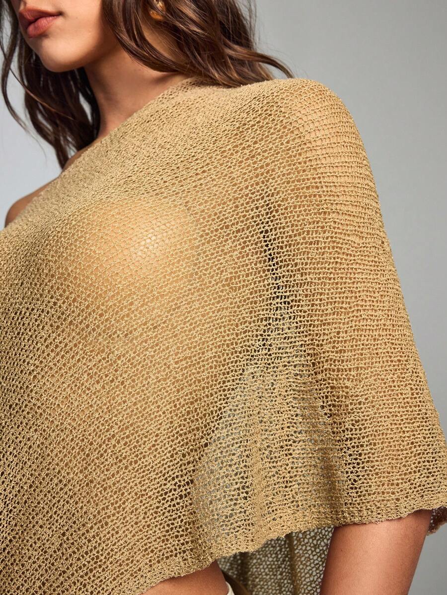 Women's casual hollow knit poncho top with boat neck, cloak sleeves, and asymmetrical hem