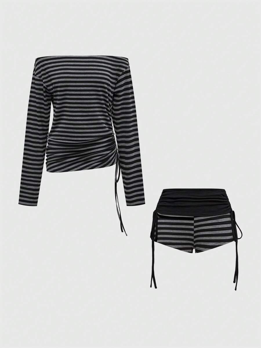 Women's black striped off-the-shoulder top with ruched drawstring knot detailing and extra-long sleeves.