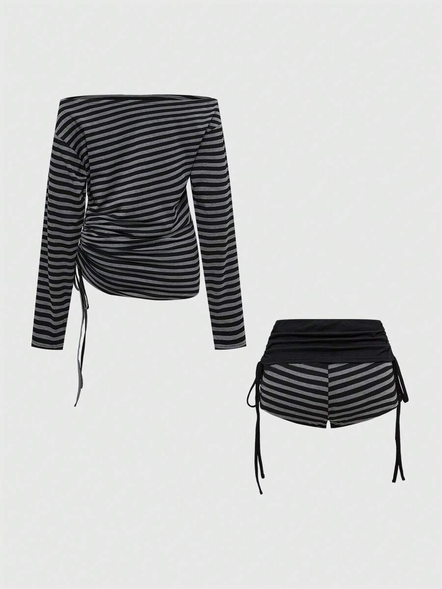 Women's black striped off-the-shoulder top with ruched drawstring knot detailing and extra-long sleeves.