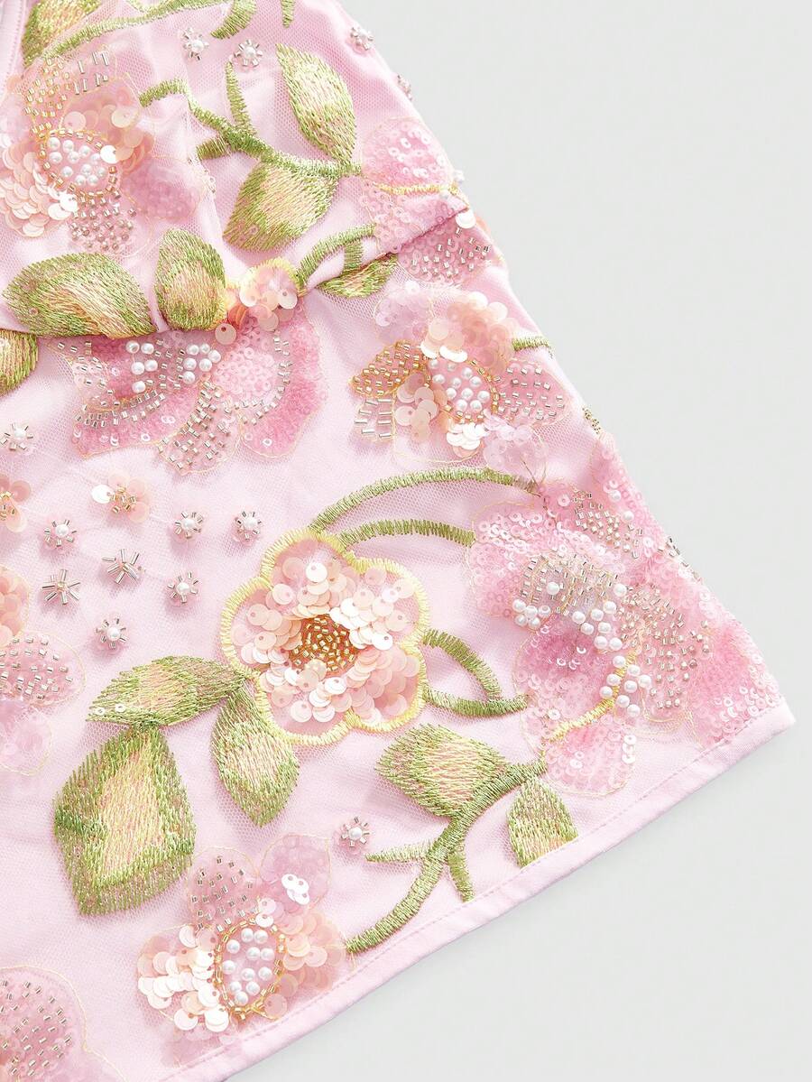 Women's floral embroidery faux pearl tie-neck crop cami top with contrast lace, ruched detail, and backless boho styling
