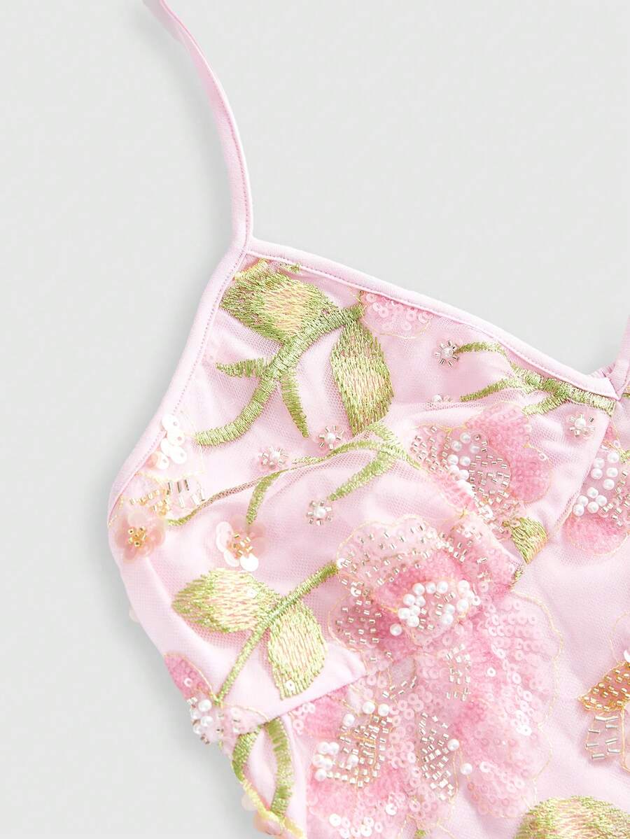 Women's floral embroidery faux pearl tie-neck crop cami top with contrast lace, ruched detail, and backless boho styling