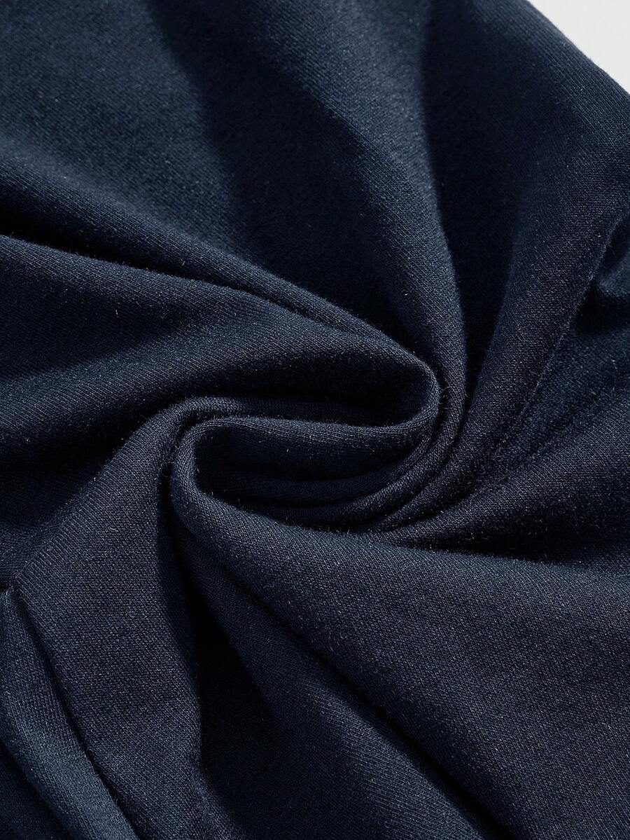 Women's low waist flare leg pants featuring an elastic drawstring waistband and ruched detail in knitted fabric.