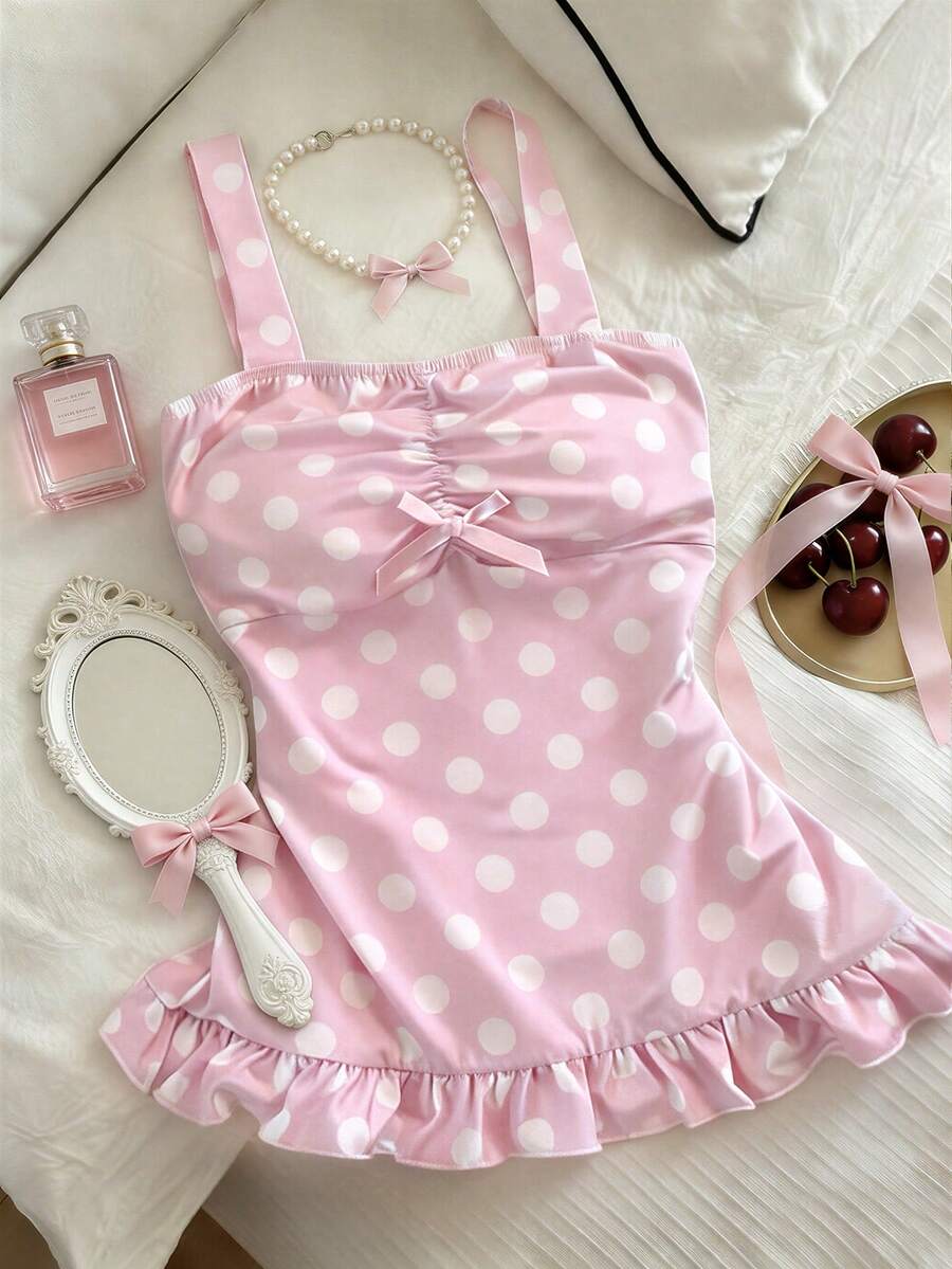 Women's retro slim-fit crop top featuring wide straps, ruched shirred detailing, asymmetrical ruffle hem, and cute bow accent.