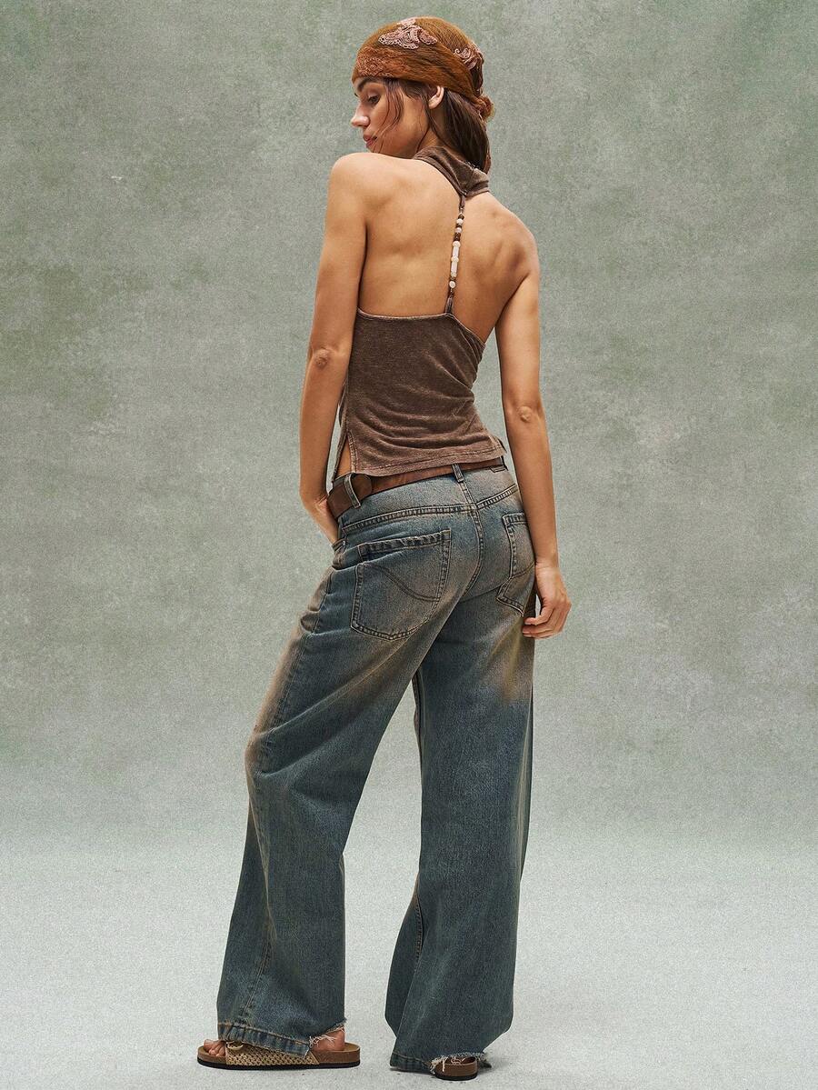 Women's casual solid color knit tank top with a backless halter neck design.