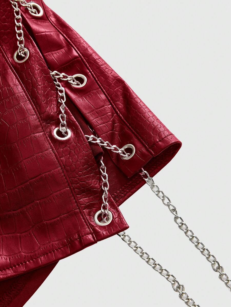 Women's low waist retro bodycon mini skirt with decorative chain, knot, and zipper details.