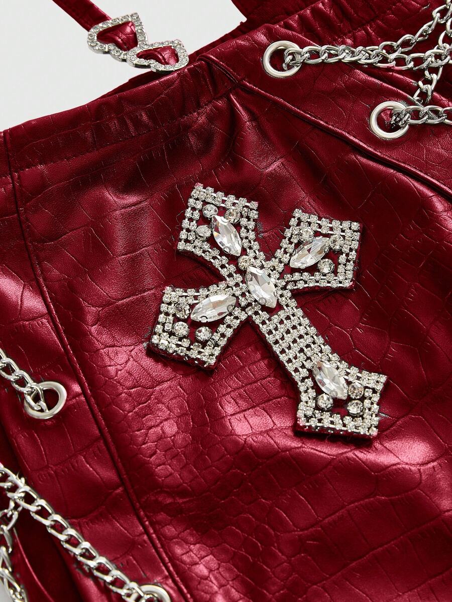 Women's low waist retro bodycon mini skirt with decorative chain, knot, and zipper details.