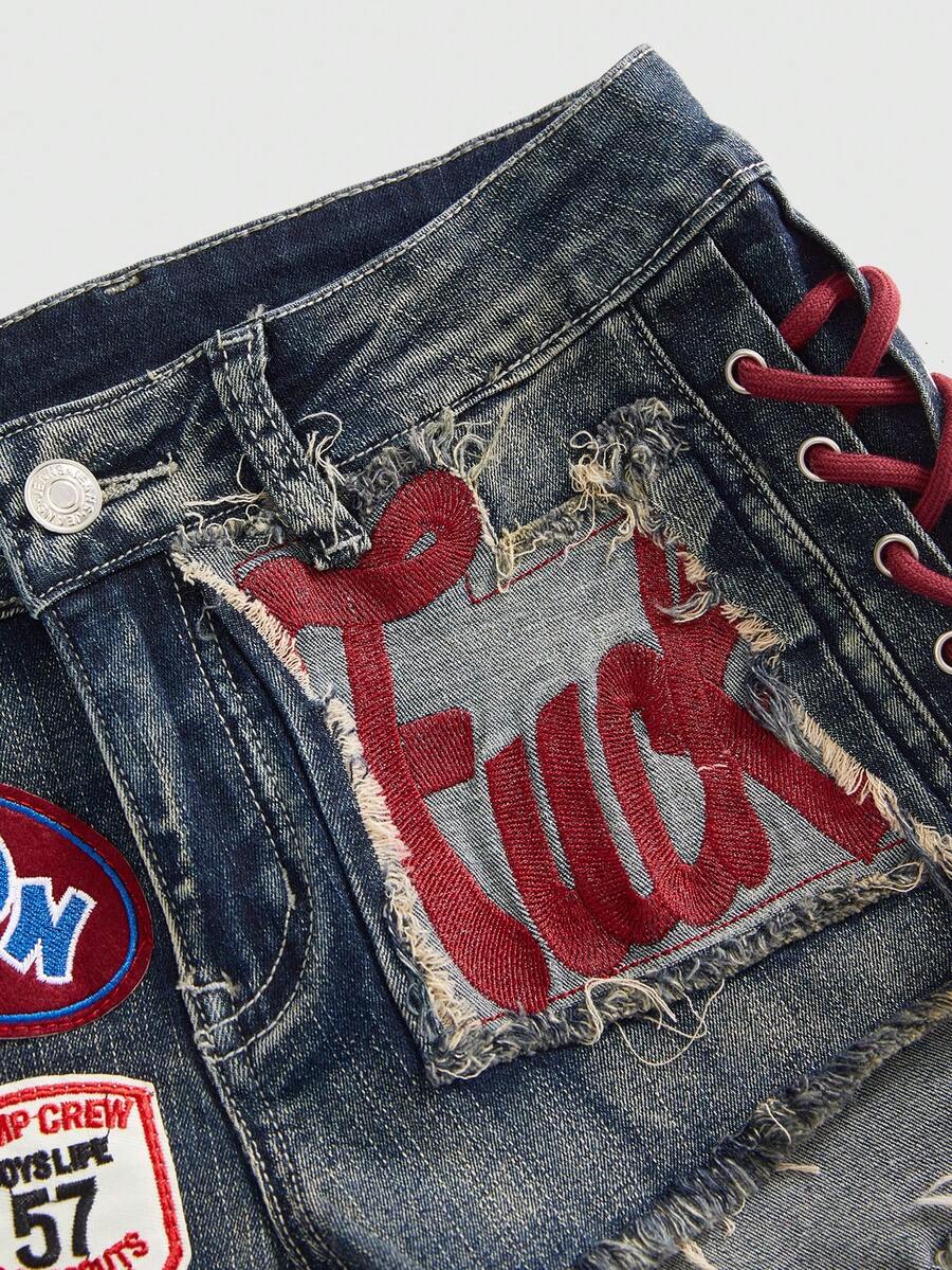 Women's Y2K low waist camo mini skort shorts featuring lace-up knot details, grommet eyelets, graphic lettering pattern, and a zipper fly.
