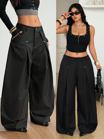 Women's black high-waist wide-leg pants in loose fit woven fabric with button and zipper closure