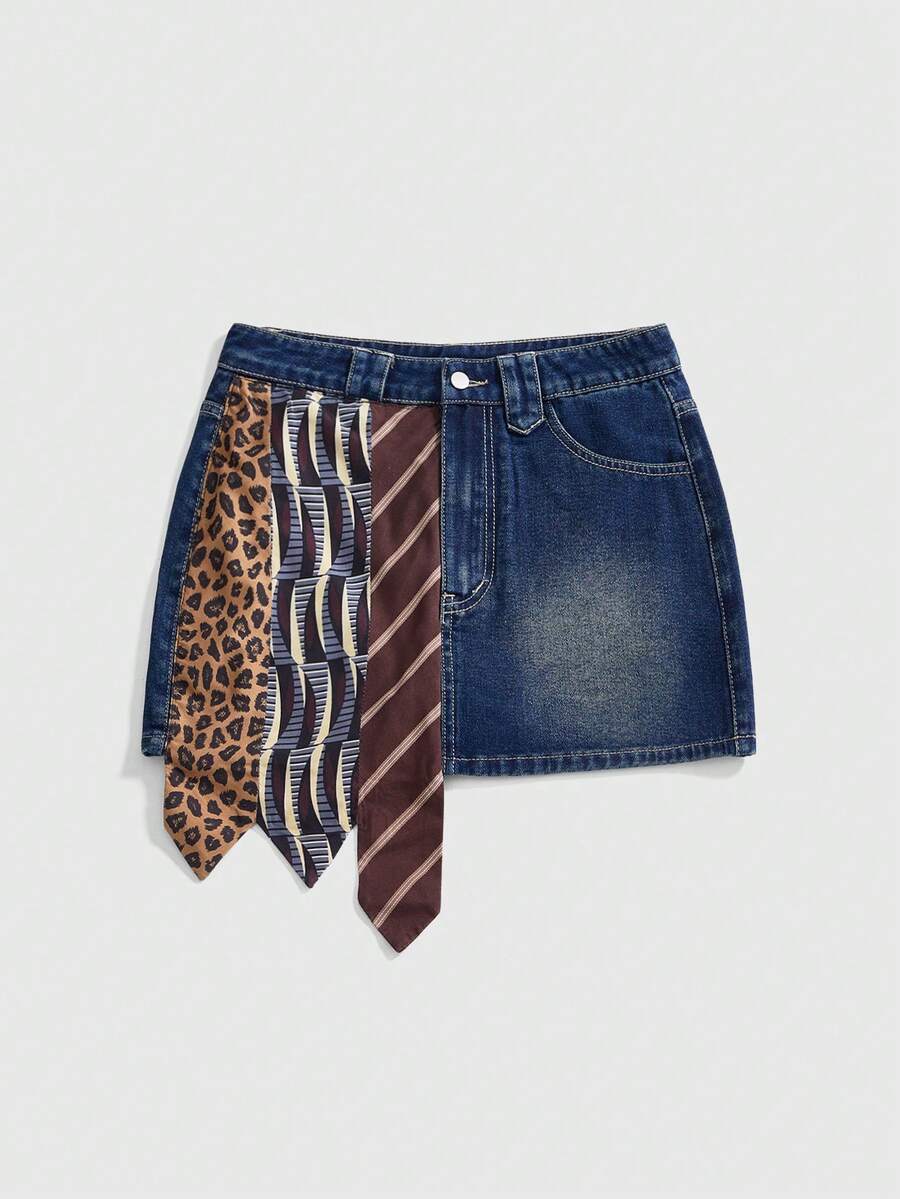 Women's low-waist asymmetrical mini skort featuring button, zipper, and pocket details in an A-line cut.