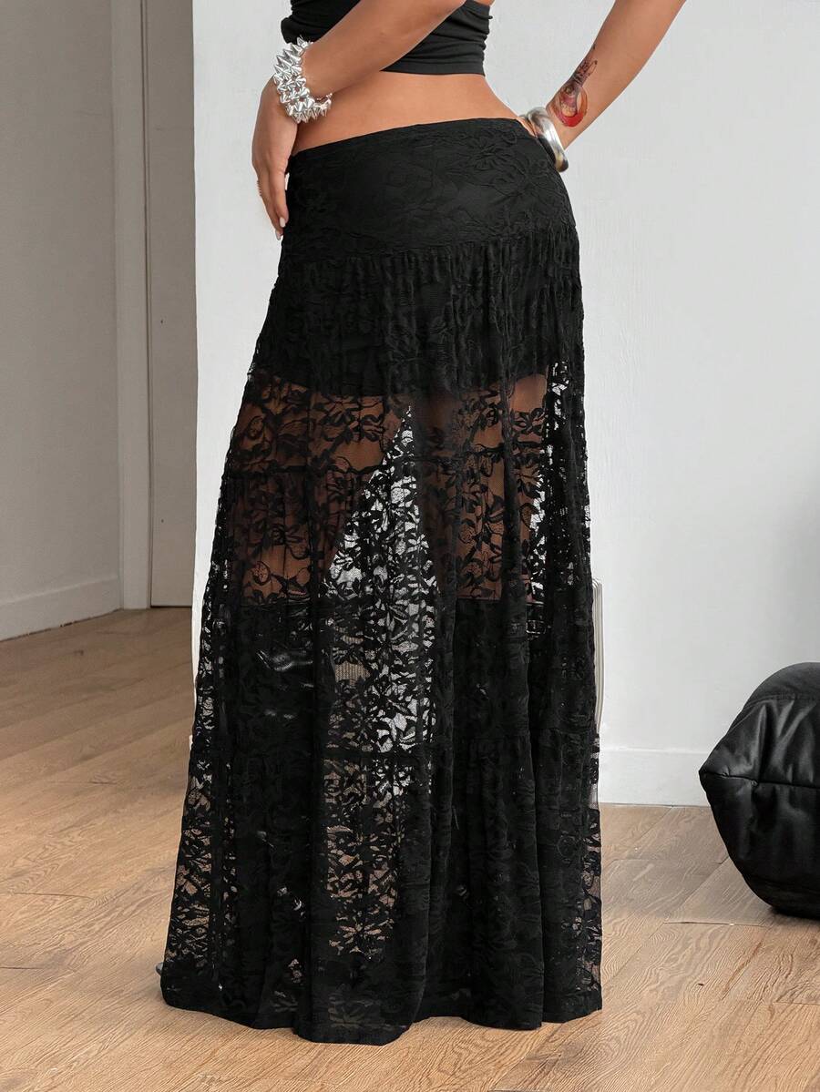 Women's red plaid long skirt featuring a low-rise waist and a side slit in lightweight woven fabric.