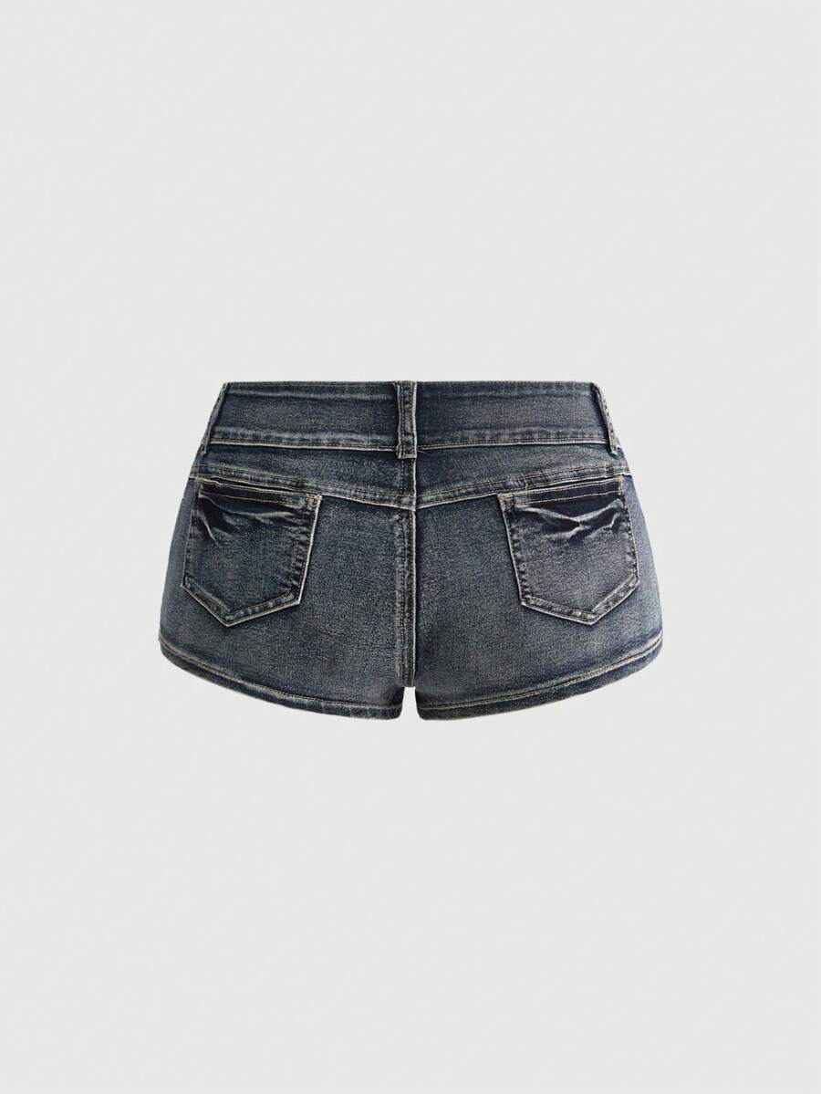 Front view of women's ultra low waist denim mini shorts with double metal button accents and zipper fly