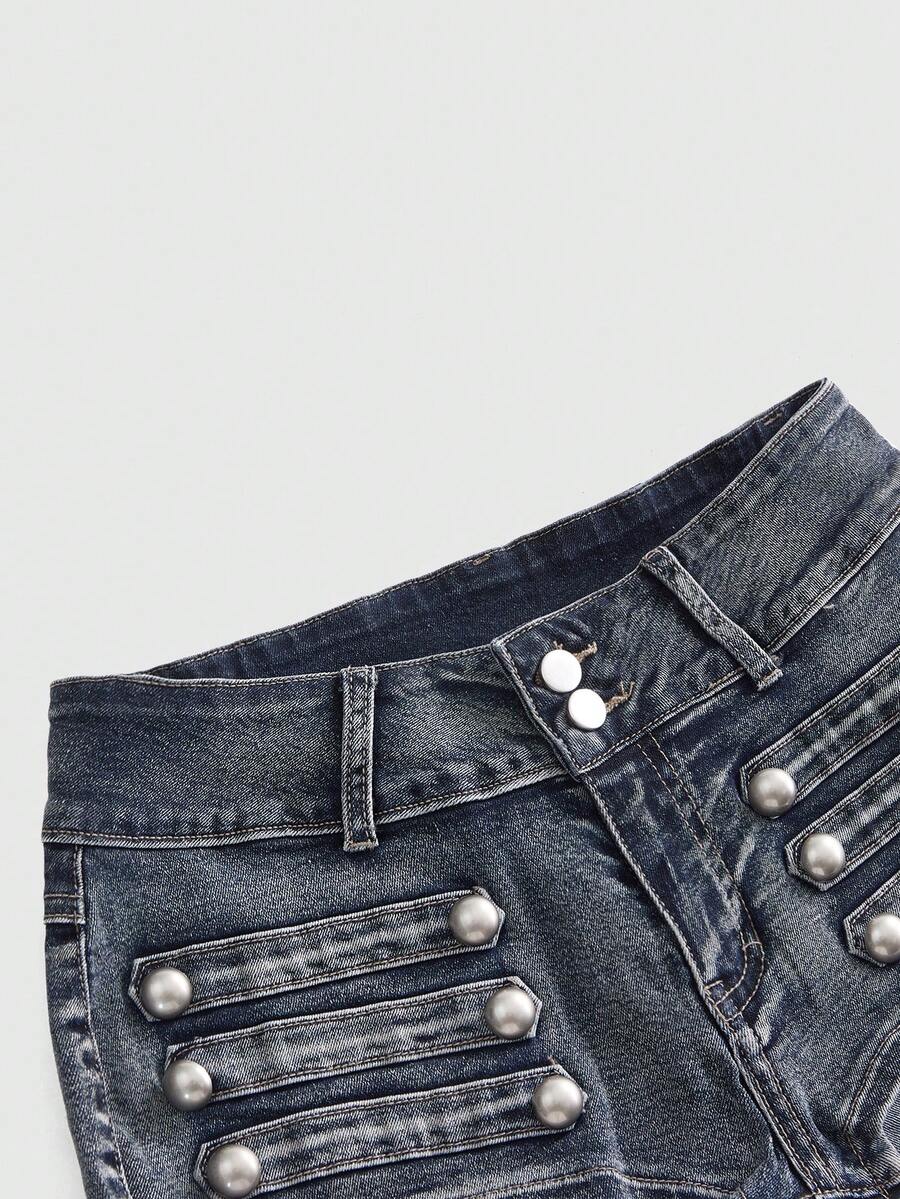 Front view of women's ultra low waist denim mini shorts with double metal button accents and zipper fly