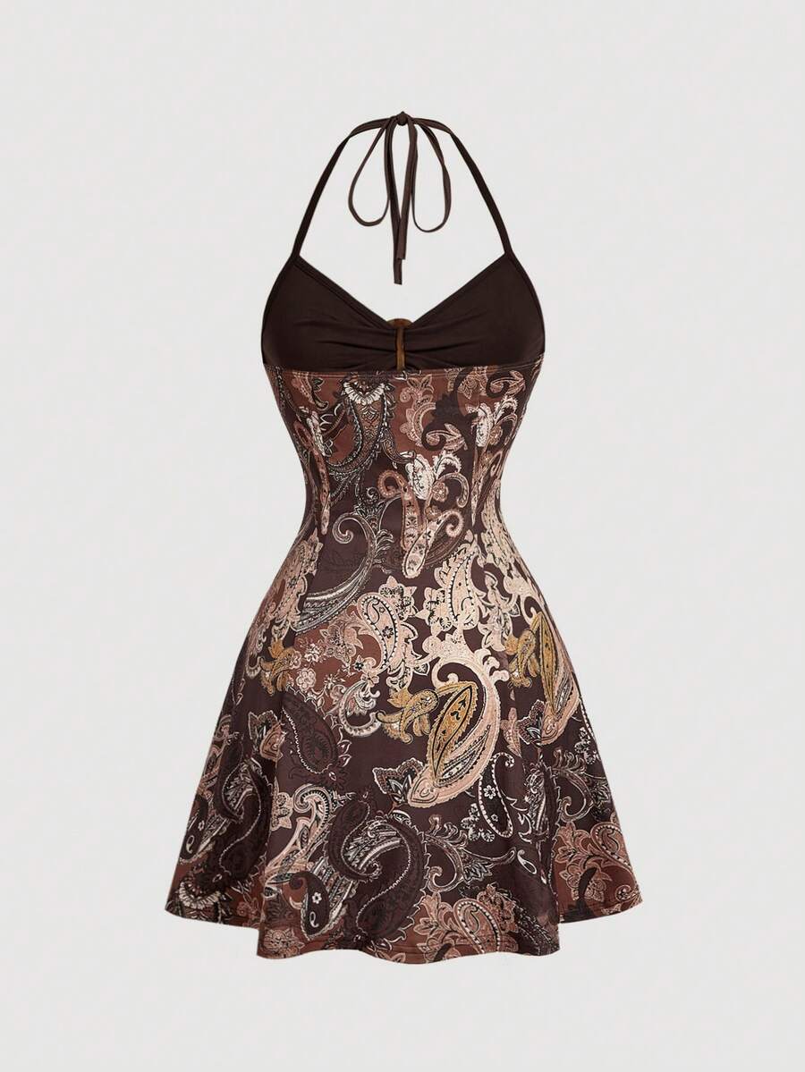 Women's apricot halter mini dress with backless knot and ring detail, sleeveless cami style, flared hem, and boho vacation look