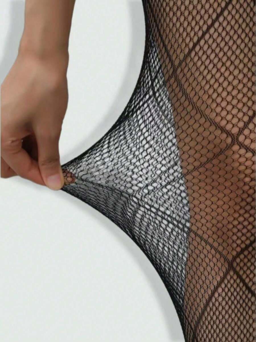 Women's black goth spider web pattern mesh tights with rhinestone details