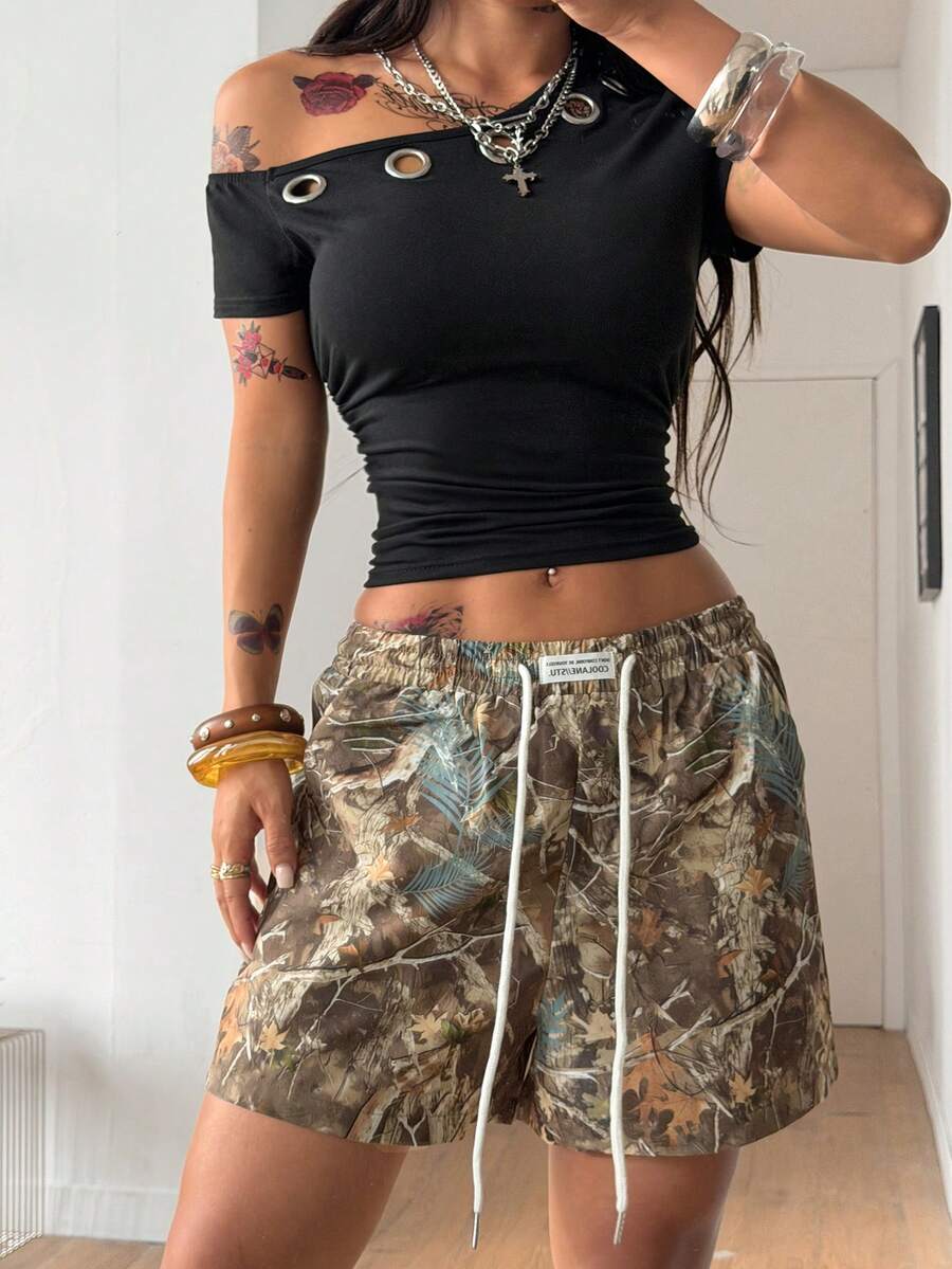 Women's casual drawstring track shorts featuring front pockets and embroidered details