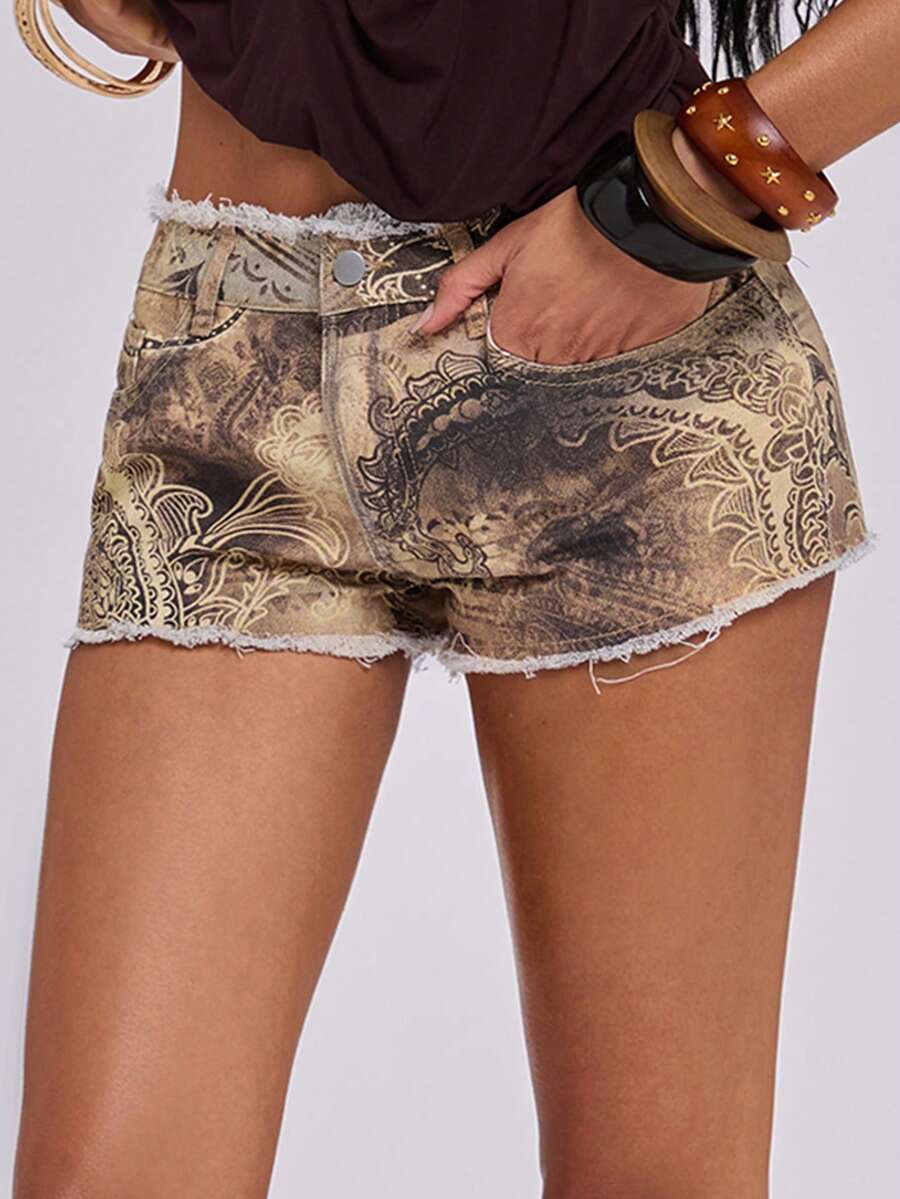 Brown paisley mini shorts with ultra low waist, raw frayed hem, pockets, and zipper detail
