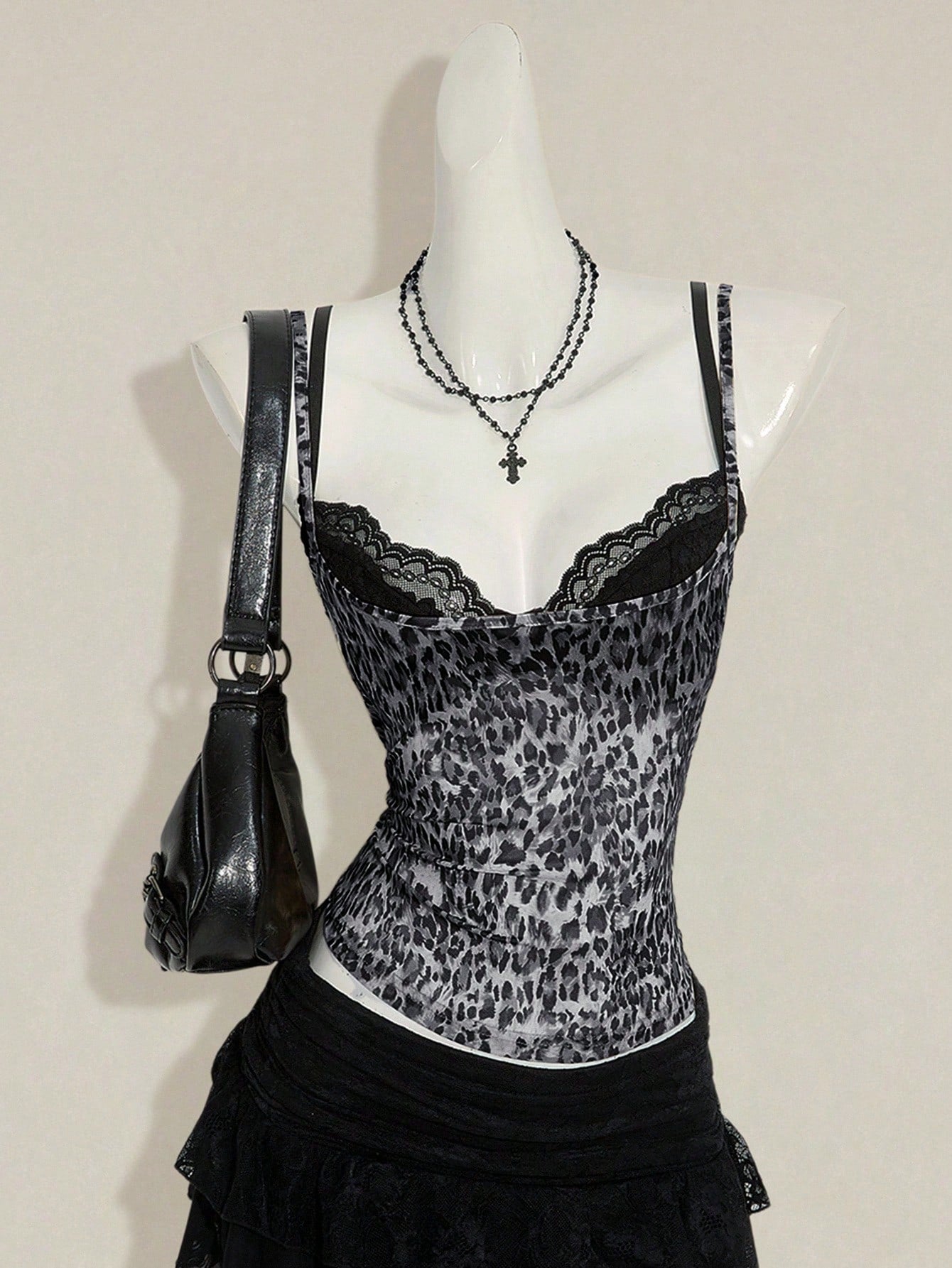 Women's grey leopard print spaghetti strap cami with black contrast lace trim and slim fit design