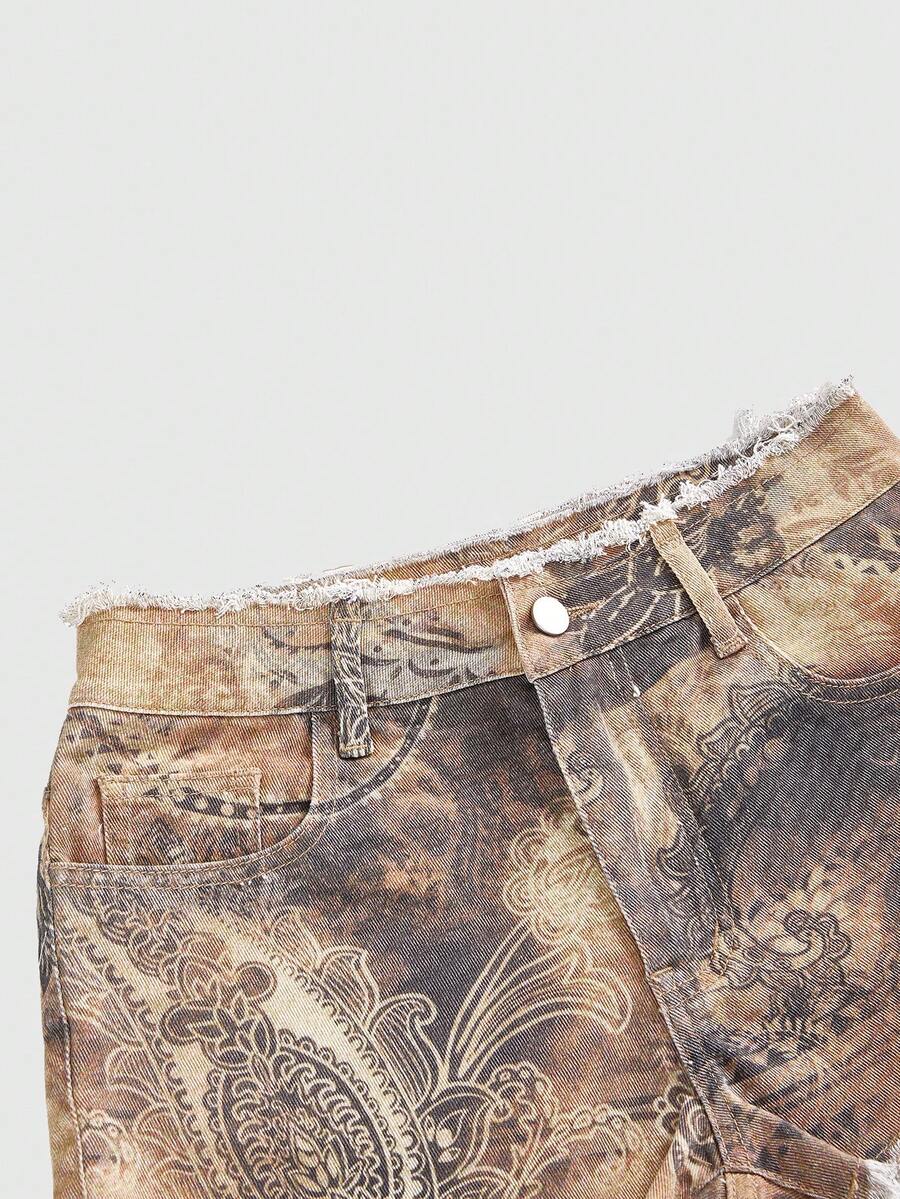 Brown paisley mini shorts with ultra low waist, raw frayed hem, pockets, and zipper detail