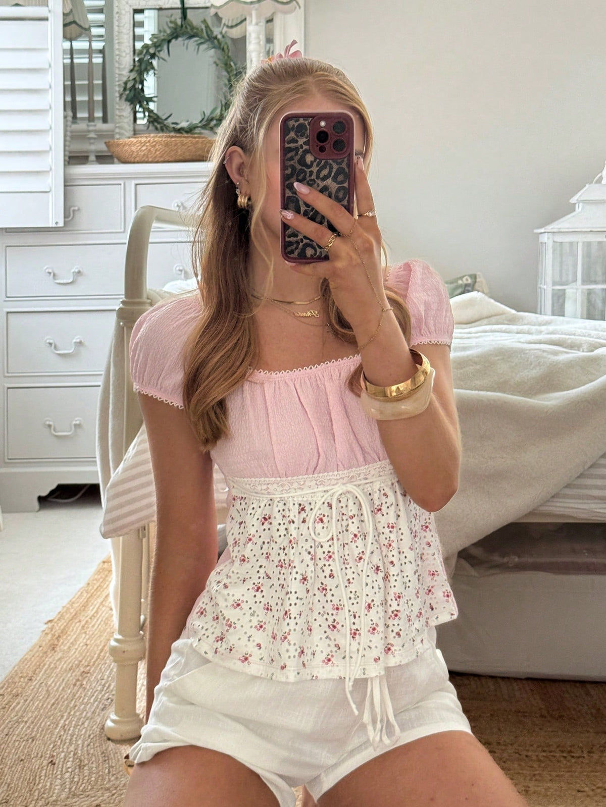 White ditsy floral women's square neck short sleeve t-shirt featuring puff sleeves, frill details, and a slim fit flared hem.