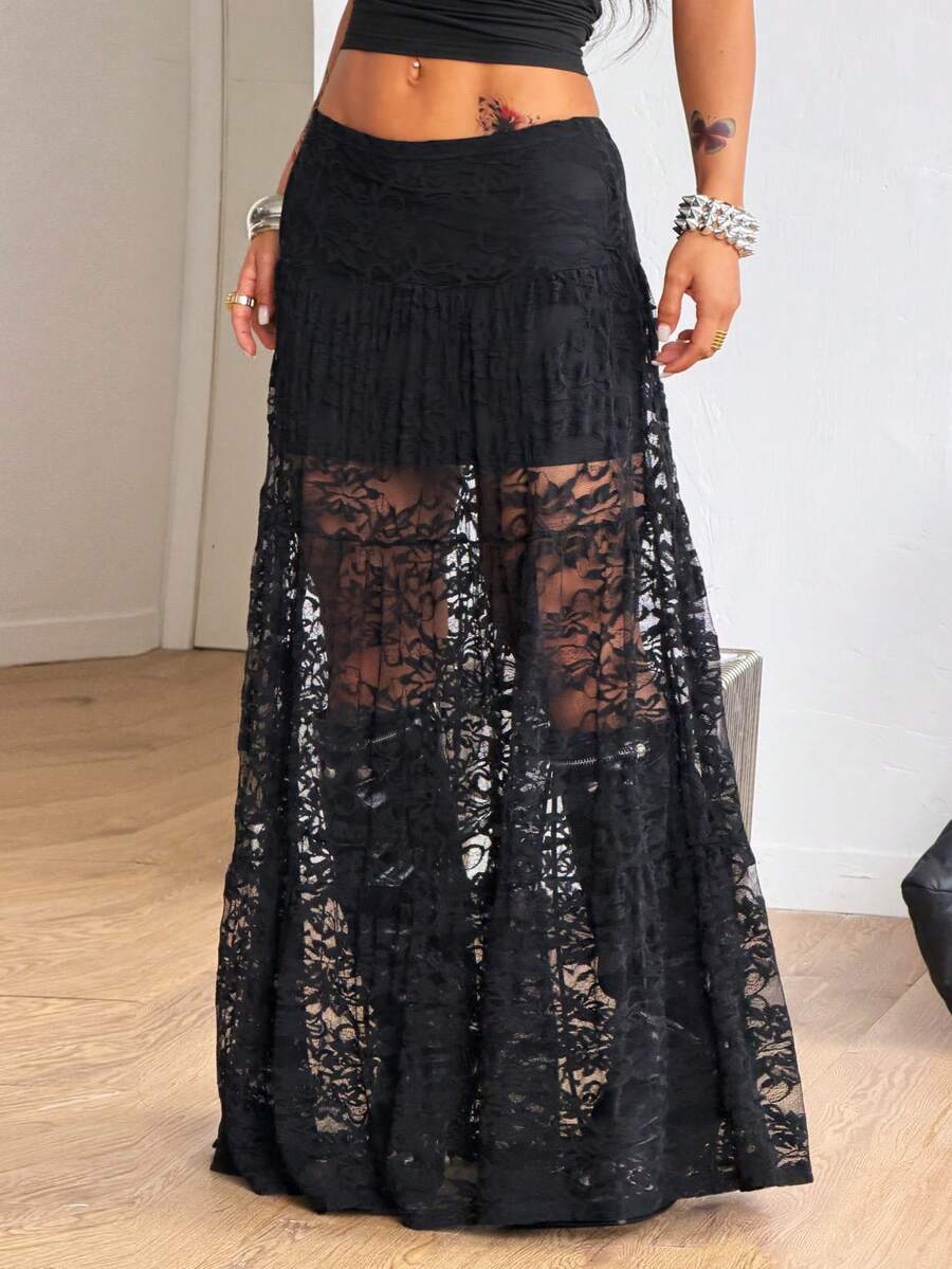 Women's red plaid long skirt featuring a low-rise waist and a side slit in lightweight woven fabric.