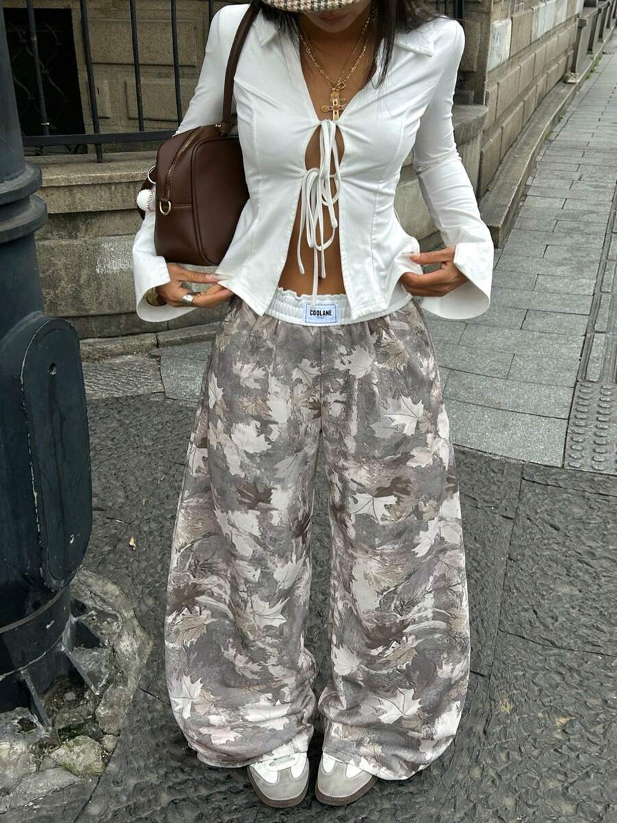 Women's striped straight leg casual trousers with elastic mid waist and side pockets