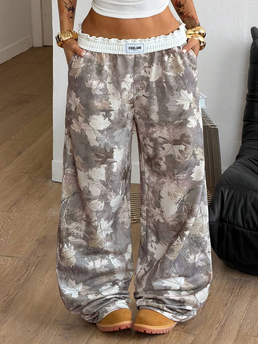 Women's striped straight leg casual trousers with elastic mid waist and side pockets