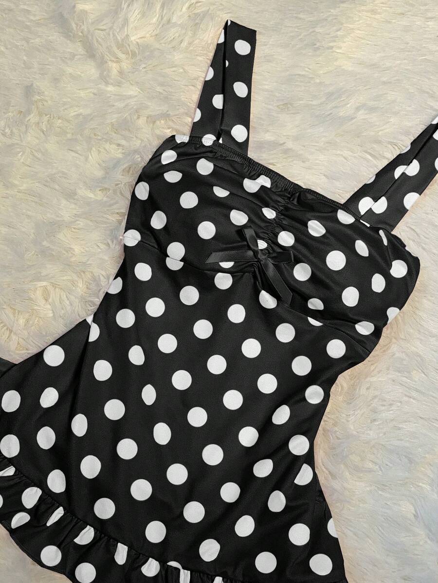 Women's retro slim-fit crop top featuring wide straps, ruched shirred detailing, asymmetrical ruffle hem, and cute bow accent.