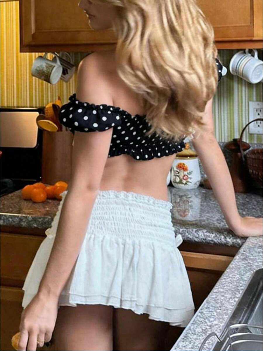 Women's Y2K off-shoulder short sleeve micro crop top with frill trim and ruched bust.